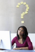 woman-with-laptop-and-question-marks-above-her-head_crop